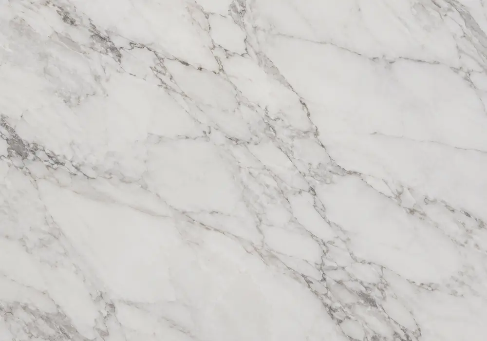Smoky Afyon Grey marble price slab with light-to-charcoal grey depth, white spiderweb veins and soft warm-brown accents.