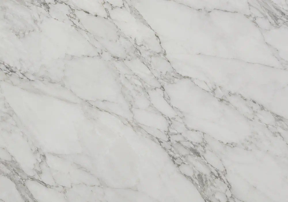 Ajax Gold slabs with diagonal gold and warm-grey veins shown polished and honed with tiles and UAE fabrication pieces in UAE