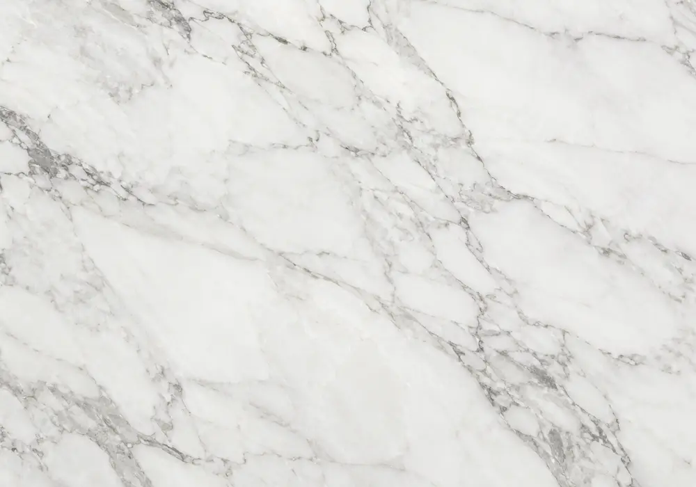 Radiant Ajax Gold stone slab with a creamy field, sweeping gold, brown and blue-grey bands and polished crystalline depth.