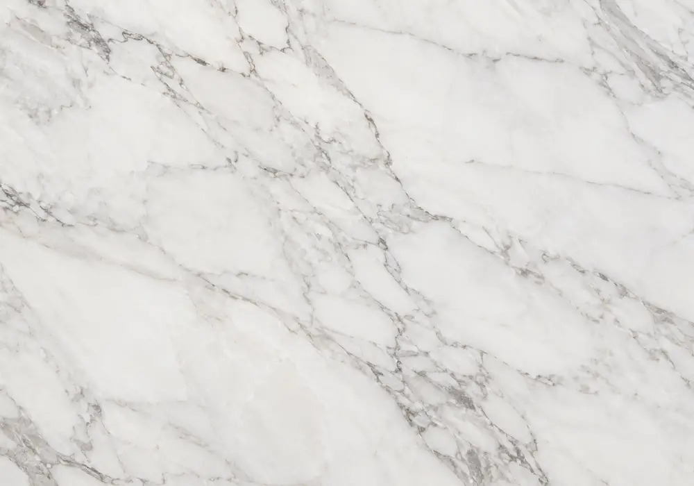White gold vein marble matched slabs with polished island, stairs, vanity and flowing grey, gold, brown and blue-grey veins