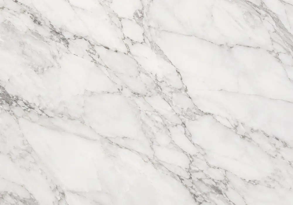 Italian green marble slabs arranged for bookmatched wall, island and vanity with polished, honed and deep forest-green tones