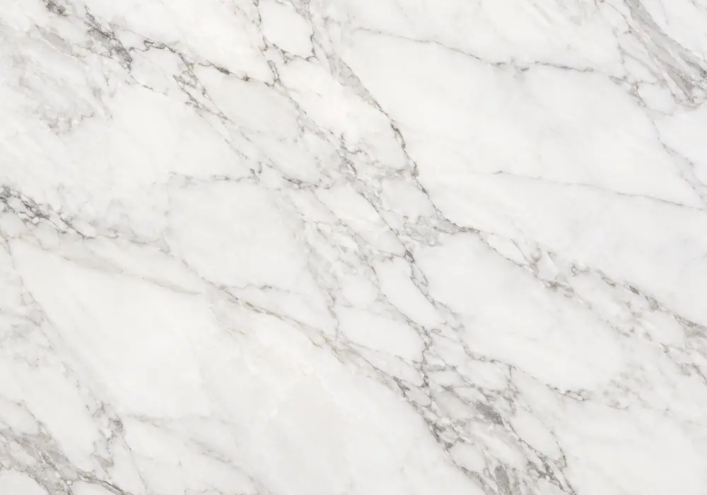 verde alpi bookmatch in a dramatic living room, showing natural veining, polished depth and refined architectural detail.