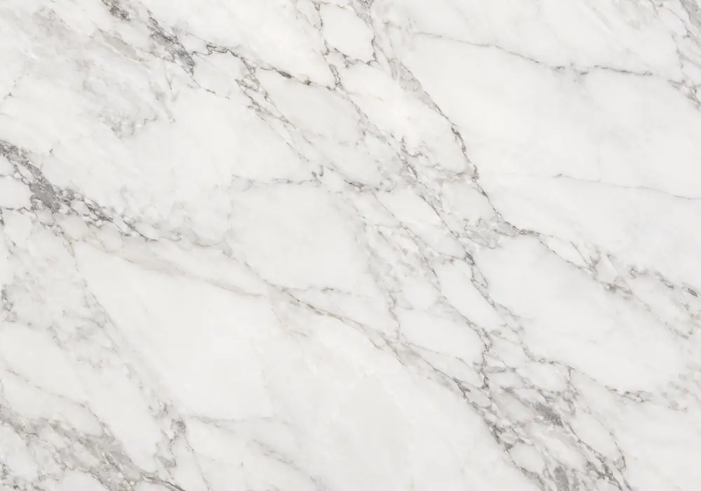 Ariston white marble slabs matched in a showroom for consistent milky-white shade and subtle veining