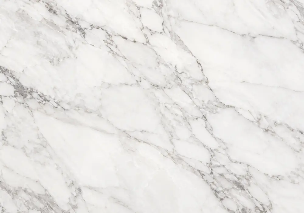 Amani Bronze marble in an executive lounge, showing natural stone texture, polished depth and refined architectural detail.