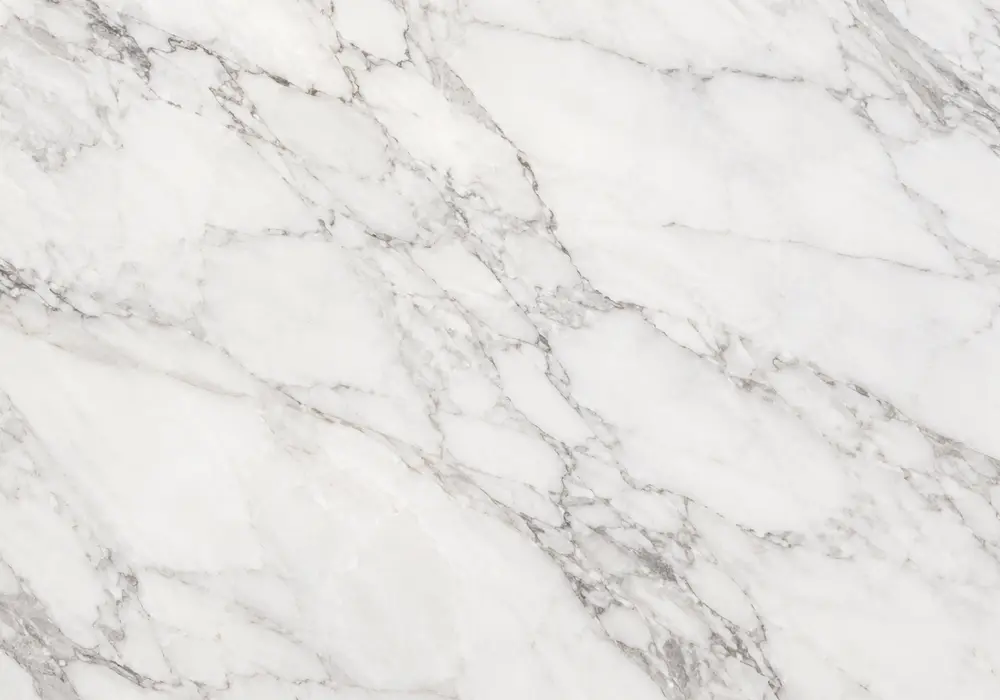 Elegant Bronze Armani marble slab showing smoky brown depth, cream-gold ribbons, fine branches and polished natural grain.