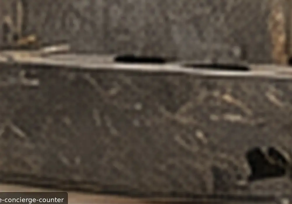 Armani Grey Marble polished and honed showroom display with full slabs, finish samples and refined applications