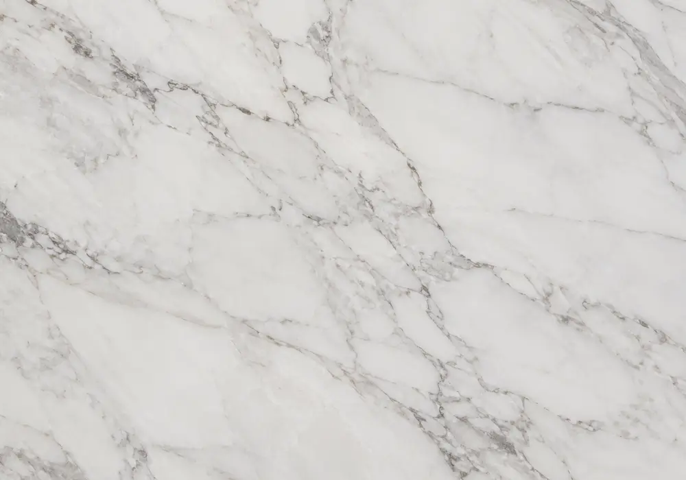 Andes Snow marble used in a luxury kitchen, showing natural veining, polished stone depth and refined architectural detail.