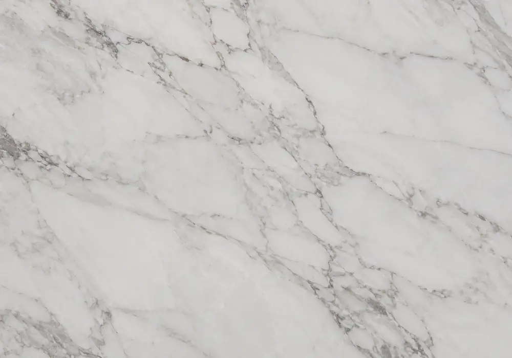 Avalanche marble price reference showing a grey and white slab with flowing waves, clouded movement, plus fine mineral depth.