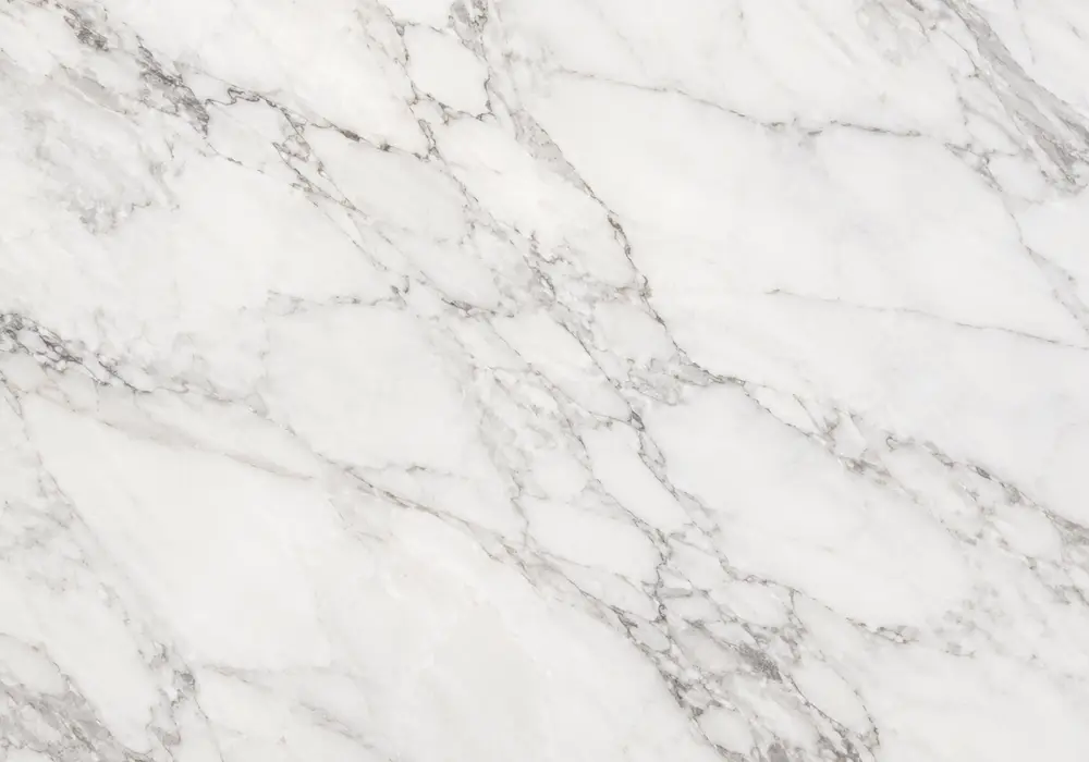 Avorio Marble dining tabletop with warm ivory stone and elegant beige, taupe and muted-gold veining.