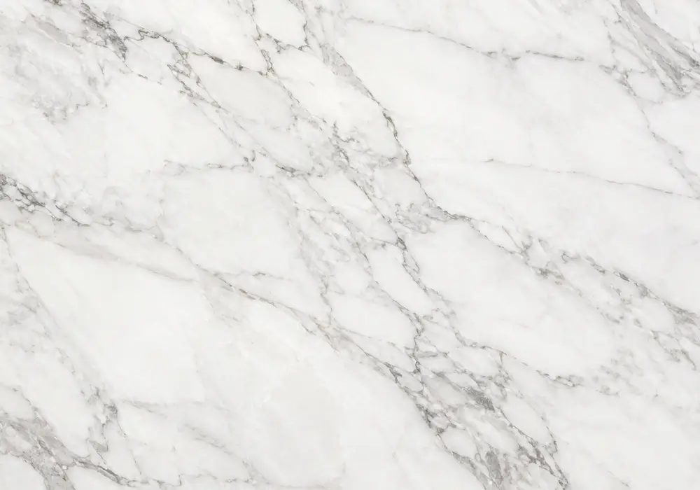 beige marble slabs showing ivory, sand and honey grades with fossils, vein-cut bands, polished, honed and brushed finishes.