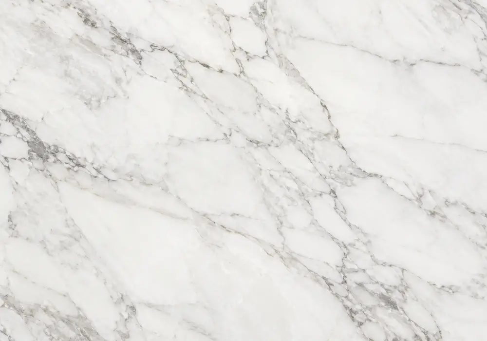 Trani Serpeggiante used in a hotel corridor, with authentic veining, polished stone depth and refined architectural detail.