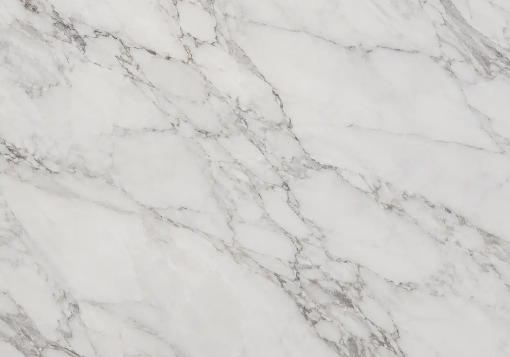 Bianco Marble bookmatched wall panel in a luxury stone gallery with mirrored veining and upright slab displays