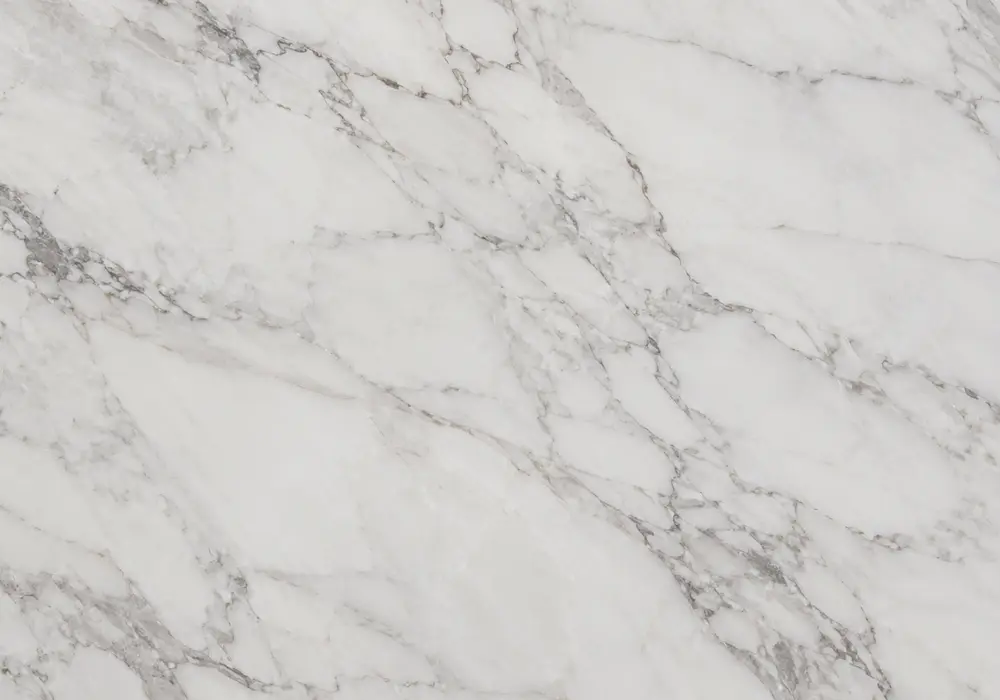 Bianco Venus marble fireplace surround with luminous white stone and classical flowing grey veining.