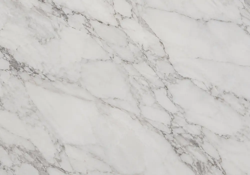 Bianco White marble bright fireplace surround with luminous pale stone and understated grey mineral movement