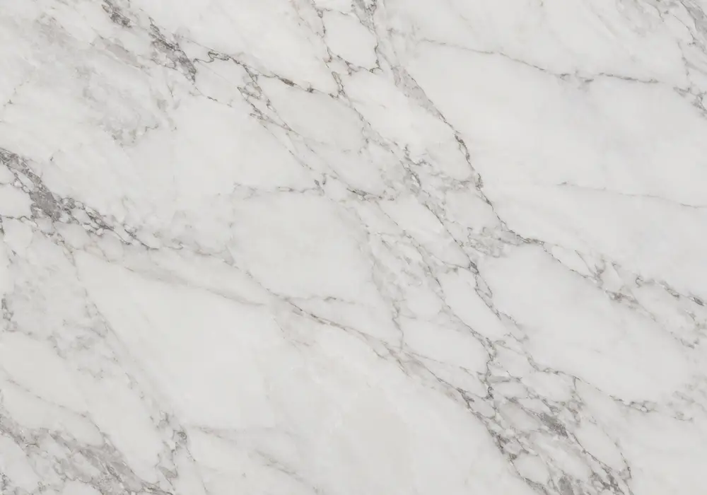 white-veined black stone used for a polished fireplace, stair treads and wall cladding with natural silver and cream veins.