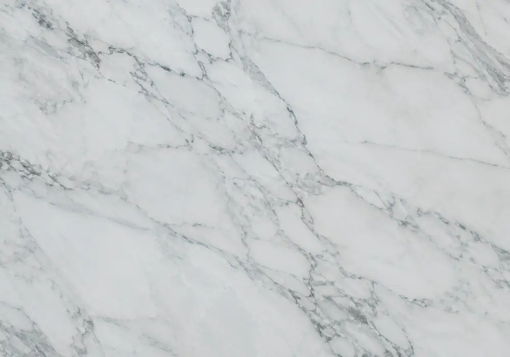 Palissandro Bluette marble slab: blue and grey, brecciated fragments and sweeping ribbons, for a richly dimensional finish.