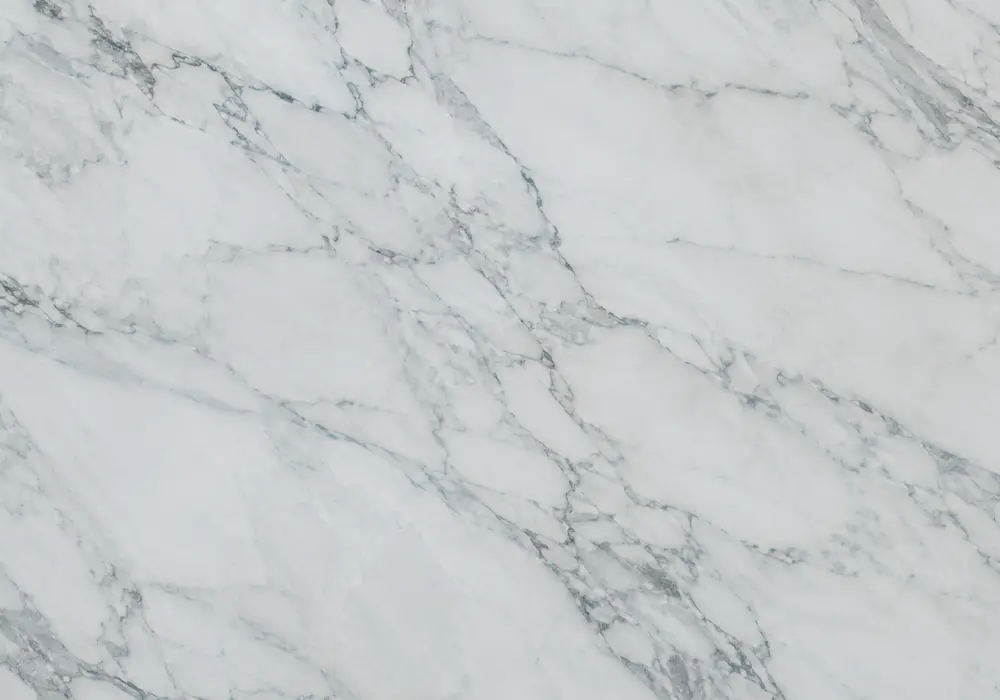 blue quartzite slabs in a high-end bathroom, showing authentic veining, natural stone depth and balanced interior lighting.