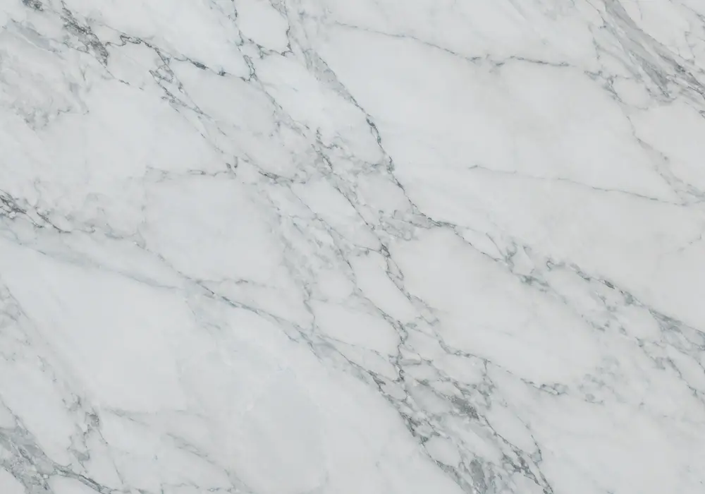 Blue Sky marble statement dining table with pastel blue stone, soft white clouds and flowing silver-grey movement.
