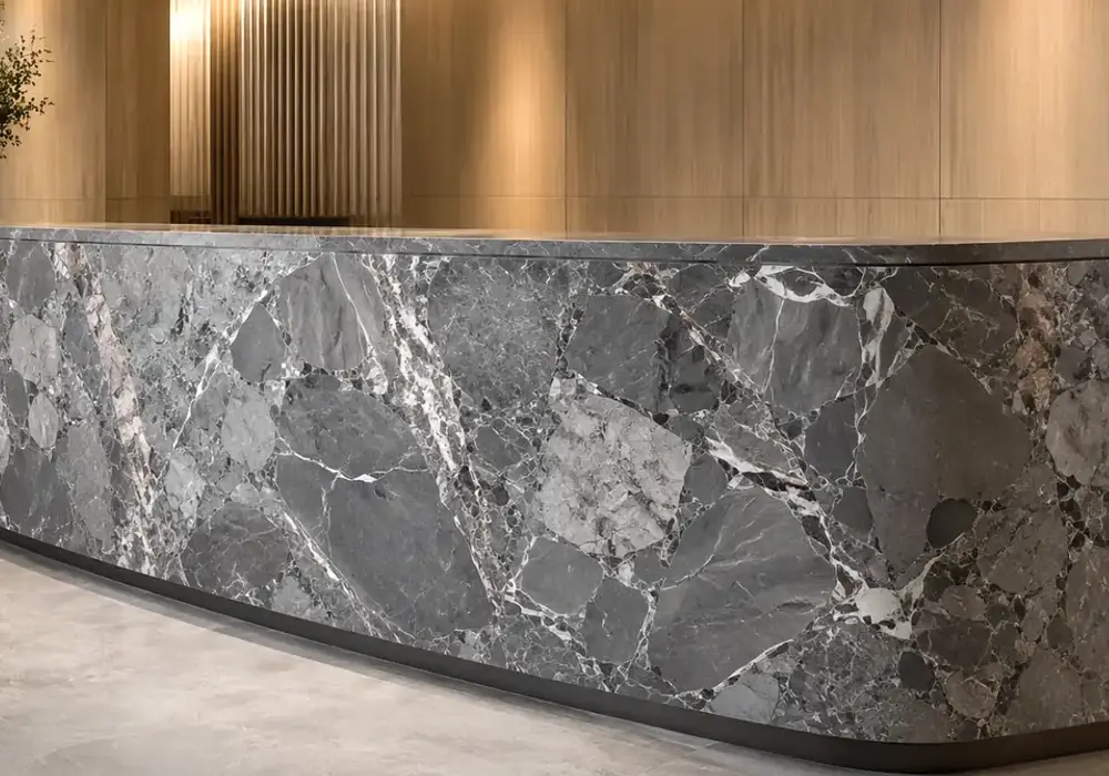 Breccia Grey marble statement console table with fragmented grey stone and bold contrasting brecciated pattern.