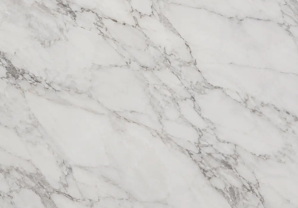 Vibrant Italian Breccia Pernice slab with red, rose, terracotta and ivory fragments divided by intricate mineral veining.
