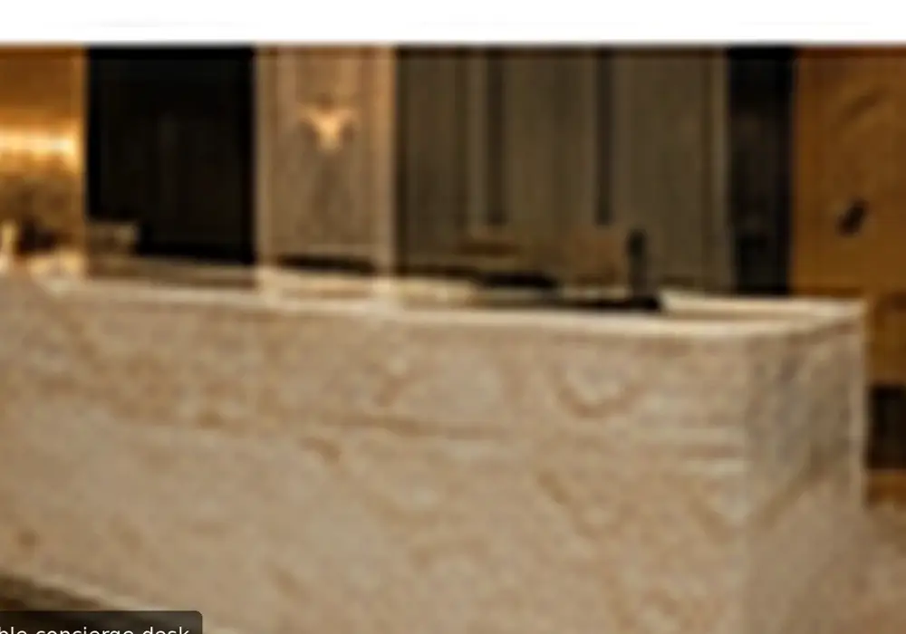 Bronzo Vita marble console table with earthy bronze, taupe and cocoa tones crossed by cream and pale-gold veins.