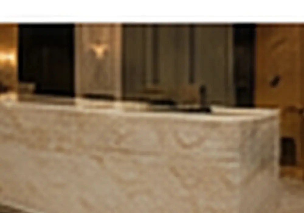Bronzo Vita marble price slab featuring bronze and brown, branching veins and mineral specks, with elegant natural movement.