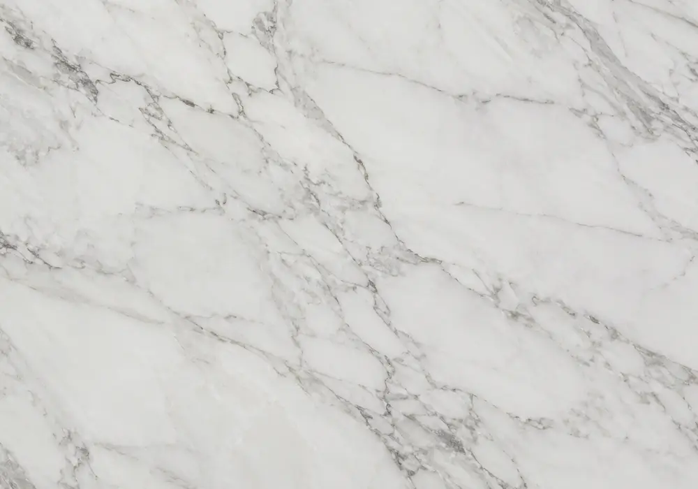 Dark Emperador marble in a hotel lounge, showing authentic veining, polished stone depth and refined architectural detail.