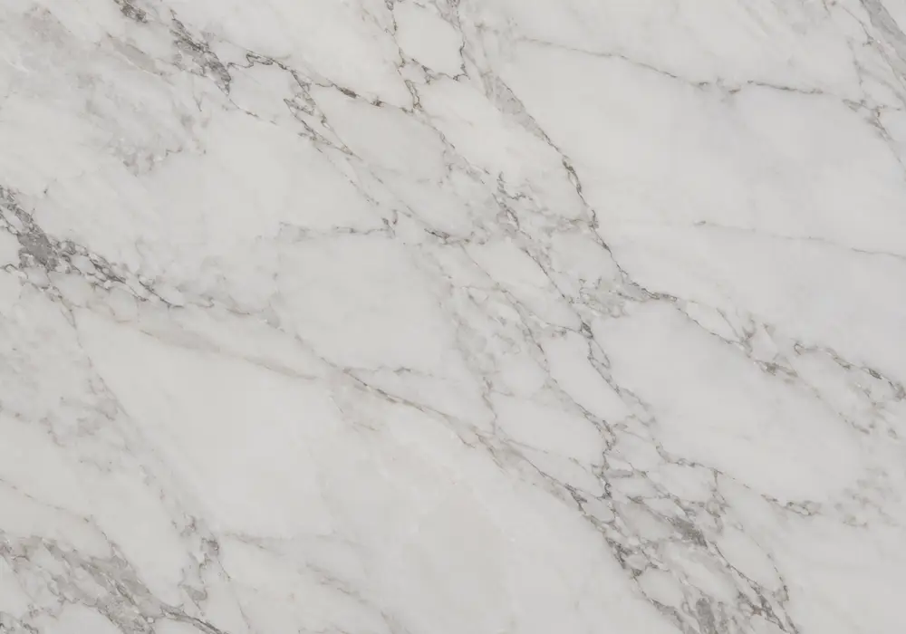 Bulgari marble price in polished white and burgundy stone with webbed veining and branching veins, across a luminous surface.