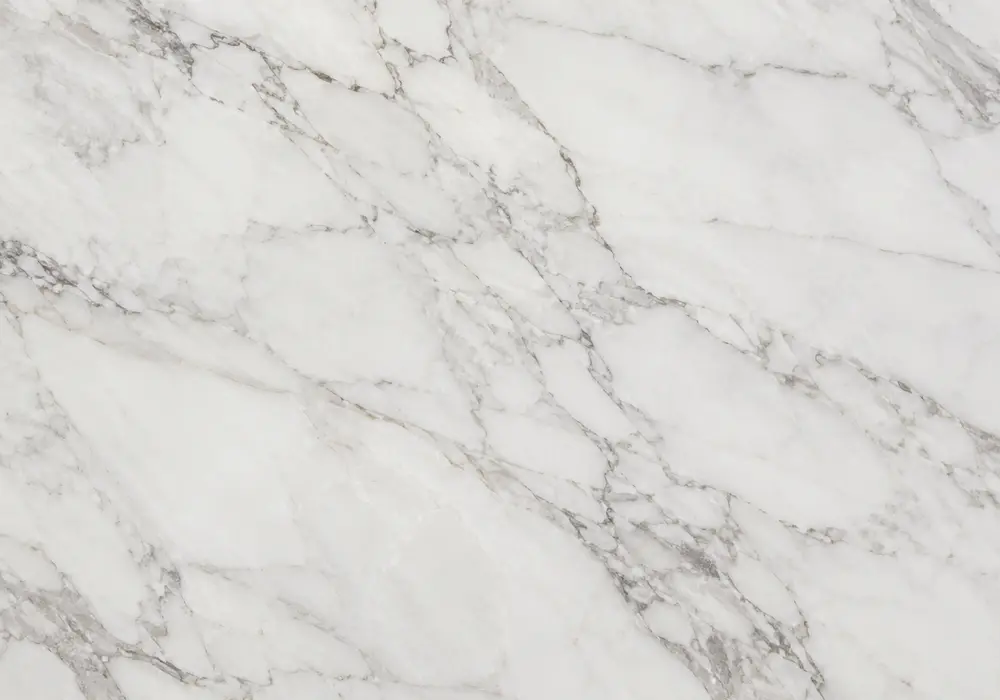 Calm Burdur Light Beige marble slab with warm almond tones, delicate cream threads, subtle speckles and fine mineral depth.