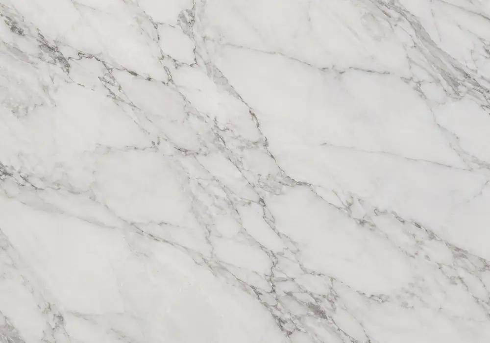 Burgundy Marble bookmatched wall panel with mirrored stone movement in a sophisticated architectural gallery