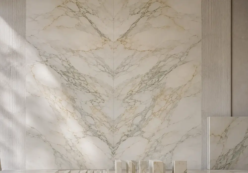 Calacatta Caldia price in polished grey and white stone with branching veins and natural veining, with smooth luminous depth.