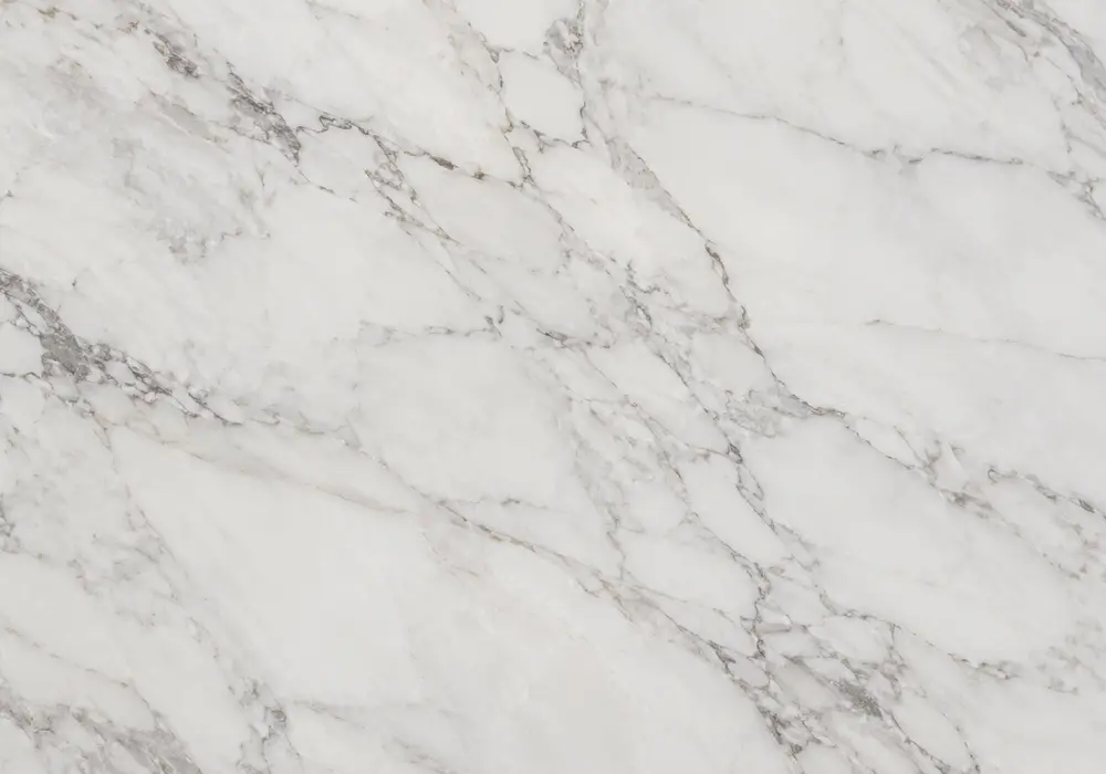 Calacatta Cream marble in a luxury kitchen, showing natural veining, polished stone depth and refined architectural detail.