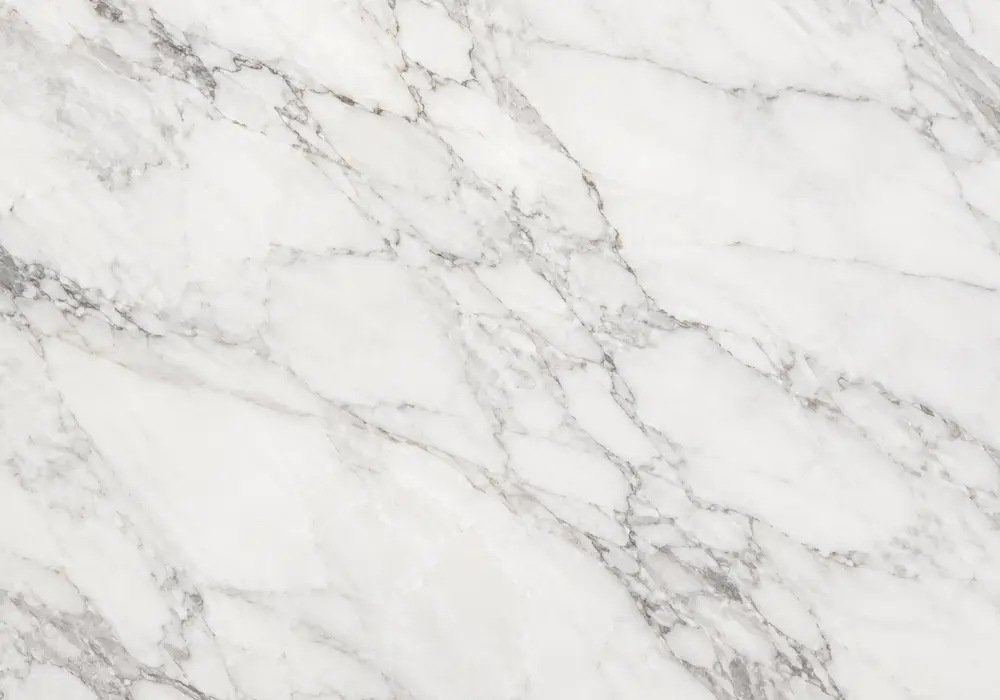 Calacatta Cremo marble price view with gold and white, sweeping ribbons and branching veins, and delicate mineral contrast.
