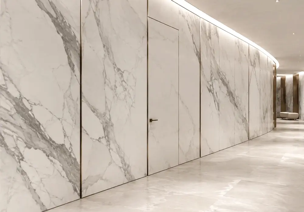 bright white marble background in a high-end kitchen, with authentic veining, natural stone depth and architectural detail.