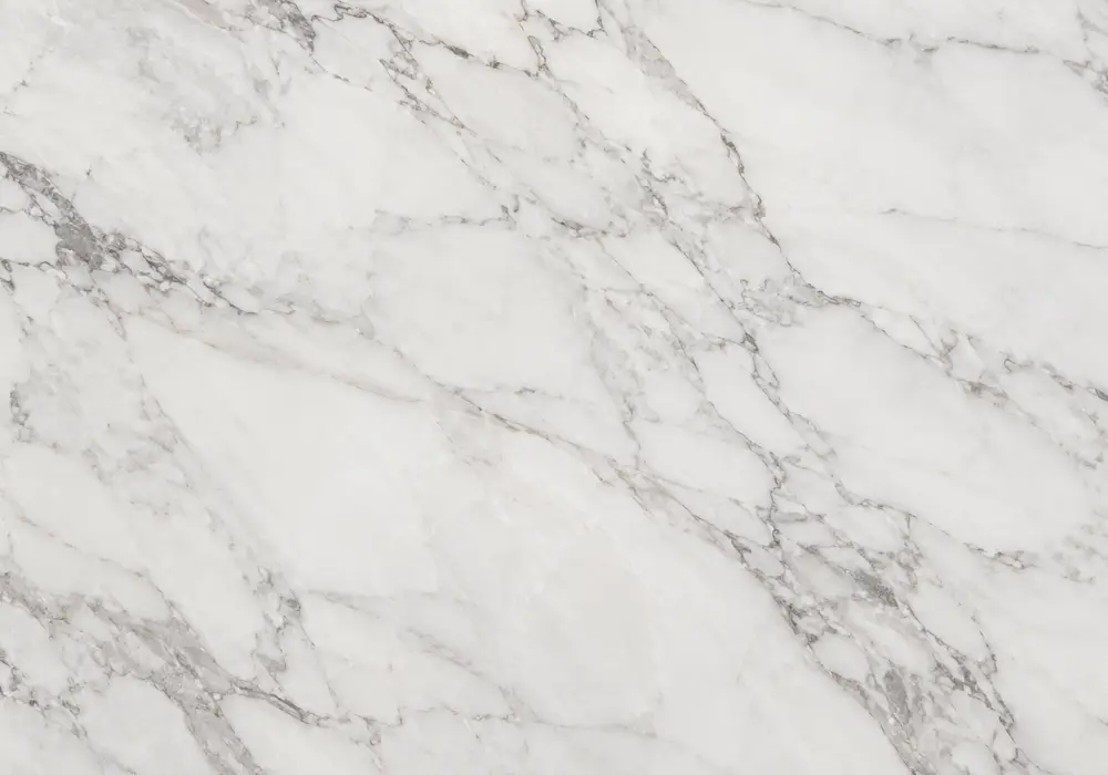 Calacatta Monet slabs featured in an ultra-luxury kitchen, showing natural texture, depth and refined architectural detail.