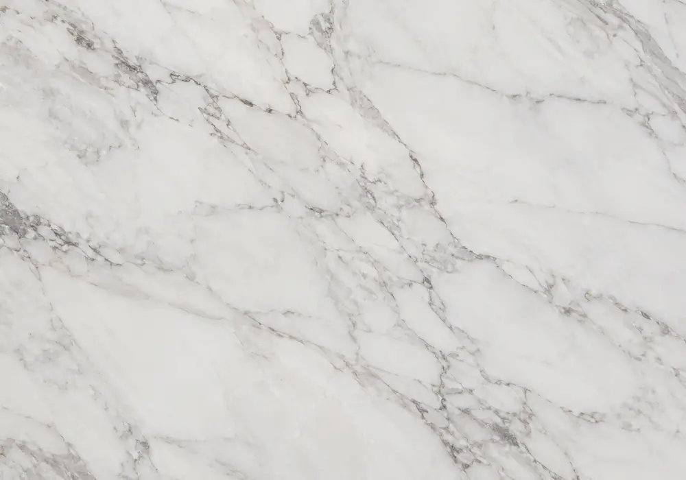 creamy white background in a luxury kitchen, showing natural mineral movement, true stone texture and architectural detail.