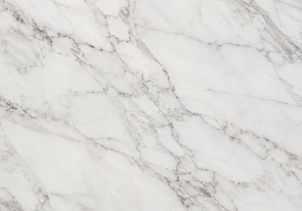 Bold grey and muted-gold ribbons sweep through Calacatta White Marble, defining the broad Calacatta trade family appearance.
