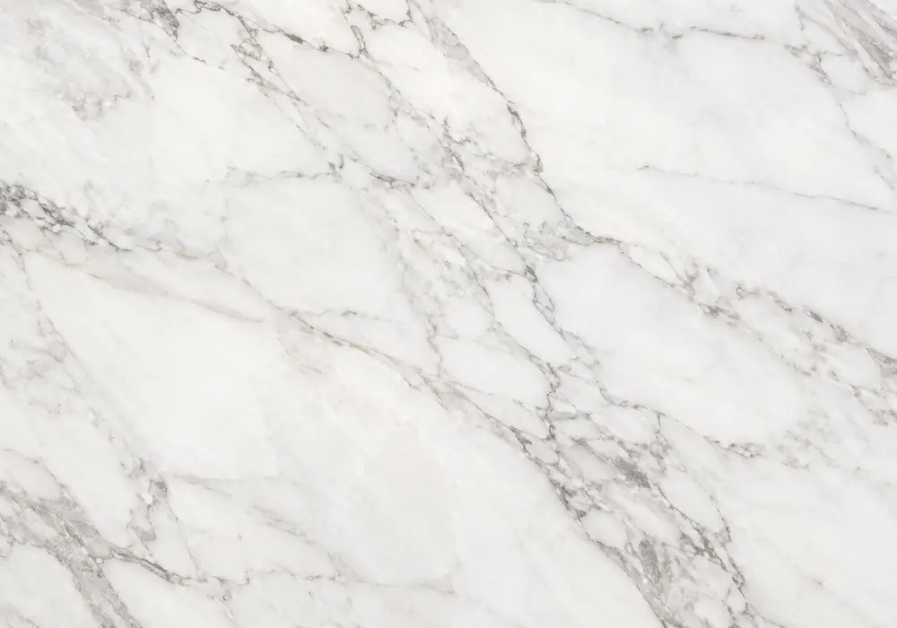Capraia bookmatch in a luxury living room, showing natural veining, realistic stone depth and refined architectural detail.