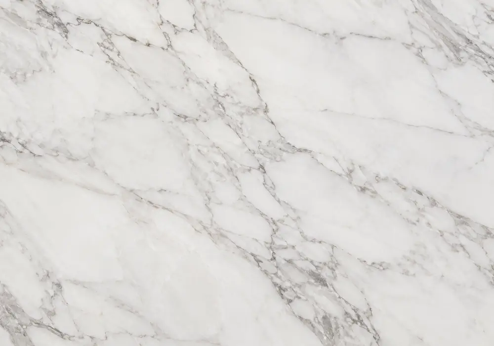 Bianco Carrara marble in a luxury bathroom, with natural veining, polished stone depth and refined architectural character.