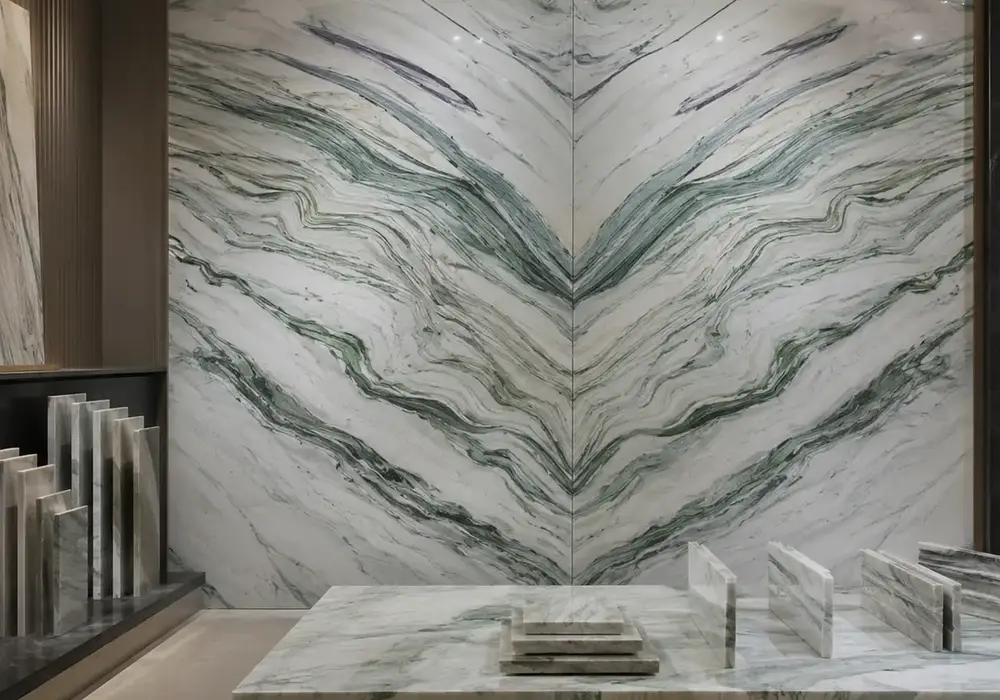 Refined slab for Verde Cipollino marble, presenting green and grey, flowing waves and folded layers, plus fine mineral depth.