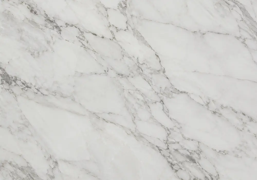 Coffee Brown Marble console tabletop displayed in a luxury material gallery with full slabs and elegant wall finishes