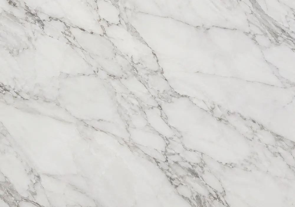 Corinthian Beige vs Crema Marfil on flooring, island and façade, comparing calm khaki-beige stone with warmer creamy marble.