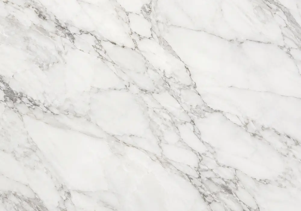 warm beige marble used in a hotel lobby, showing authentic veining, polished stone depth and refined architectural detail.