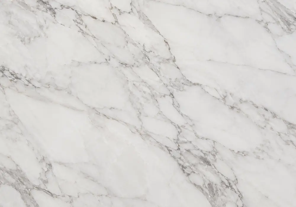 Crema d'Orcia marble foyer feature wall with pale cream, warm ivory and subtle amber-beige natural texture.