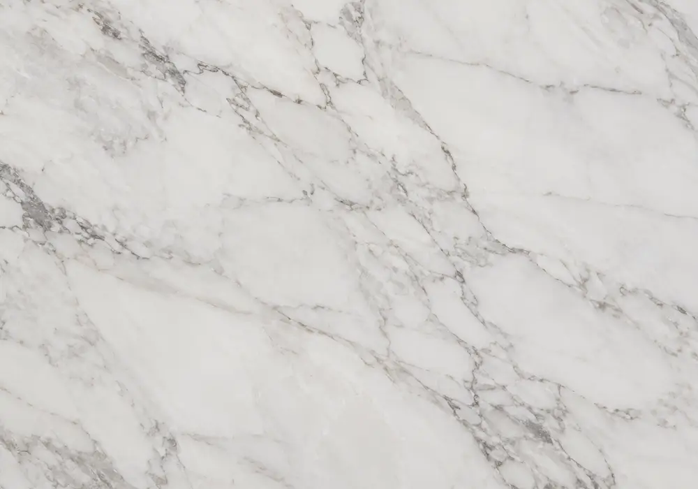 Crema Delicato marble reception wall panel with soft cream-beige stone and restrained warm mineral movement.