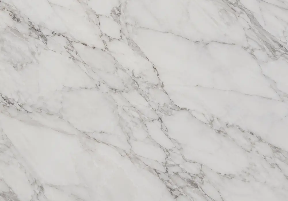 Crema Delicato marble price slab with warm ivory tones, fine taupe-brown branches, soft clouds and gently understated polish.