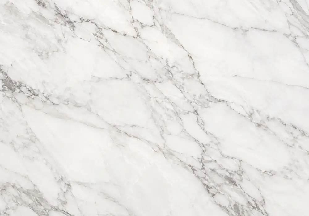 Warm ivory Crema Marble blends subtle tan veins, fossils and honey clouds, representing the versatile cream marble category.