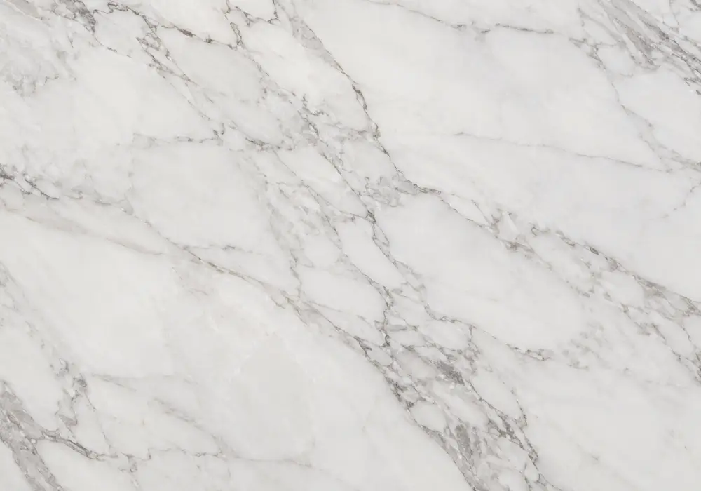 Nghệ An White marble in a luxury spa interior, with natural veining, polished stone depth and refined architectural detail.