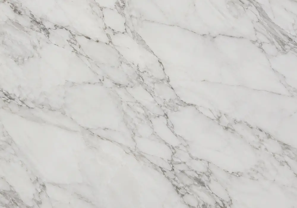 breccia sarda marble in an elegant hotel lobby, showing natural veining, polished depth and refined architectural detail.