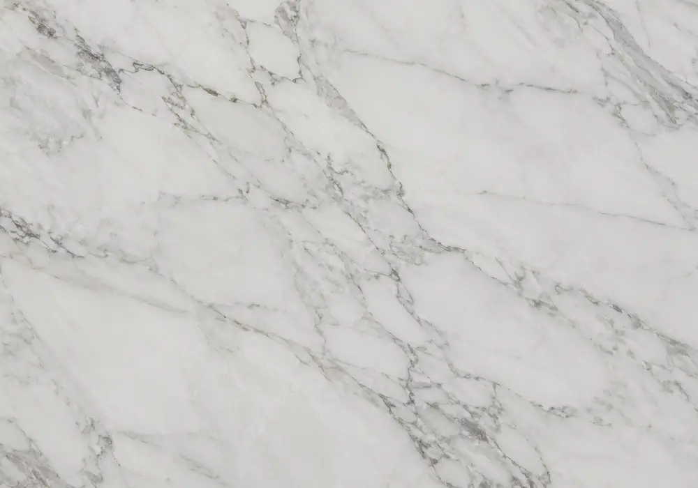 Daino Beige Marble slabs displayed side by side for warm grade matching in a professional stone showroom